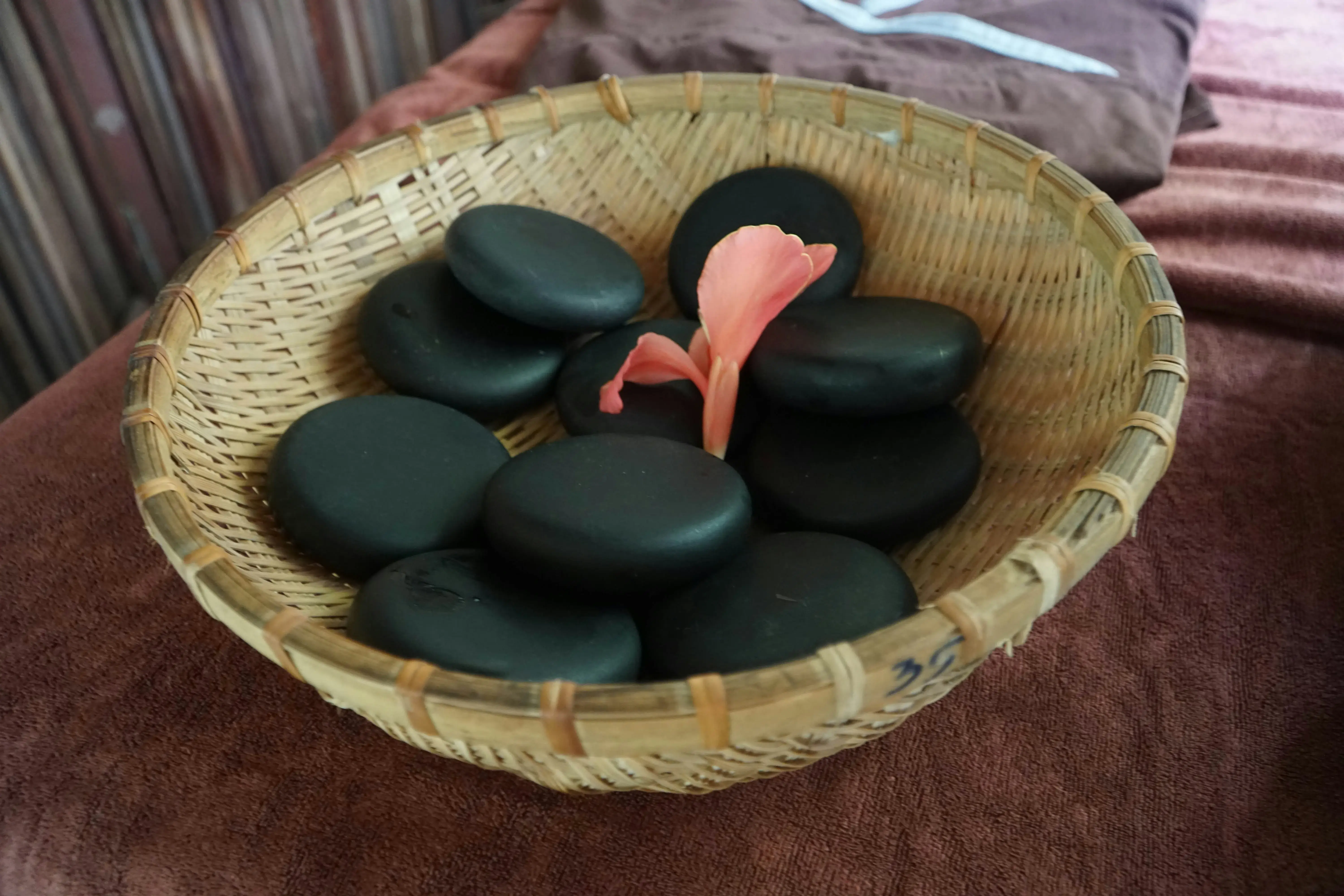 Hot stone therapy session